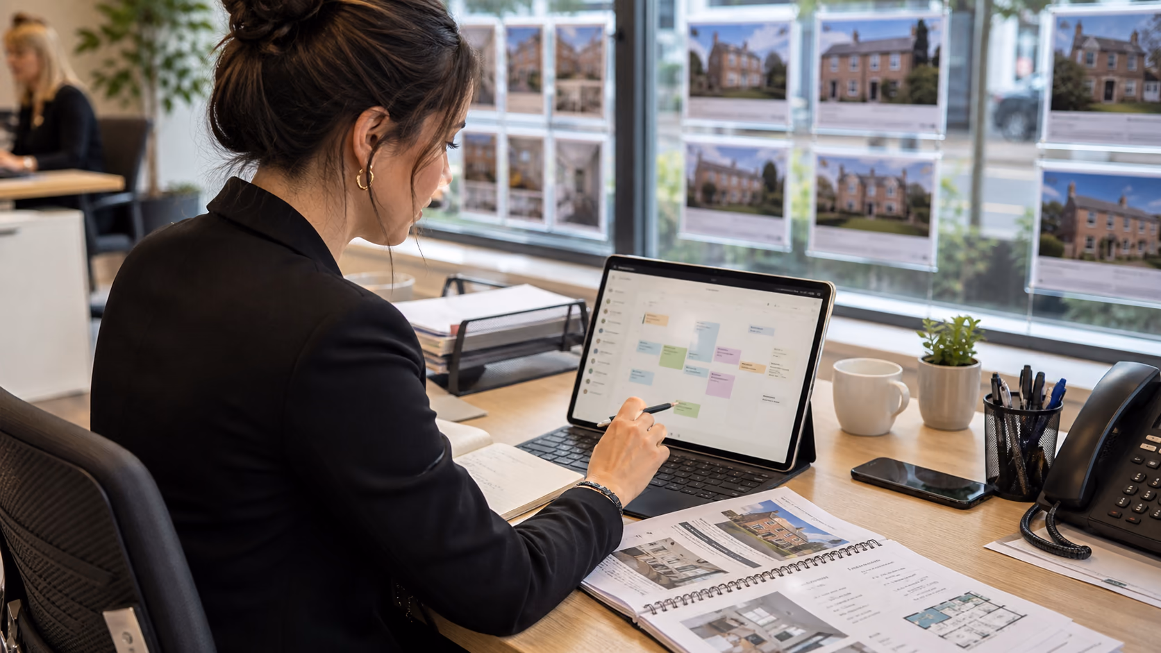 A branch coordinator moving a property viewing on a shared calendar while checking access notes and buyer availability